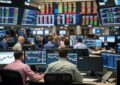 Image showing brokers analyzing top trading companies on there computers
