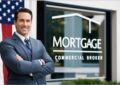 Image of a mortgage broker standing in front of a commercial property