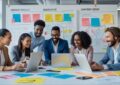 Image showing a team of digital marketing workers discussing social media post ideas